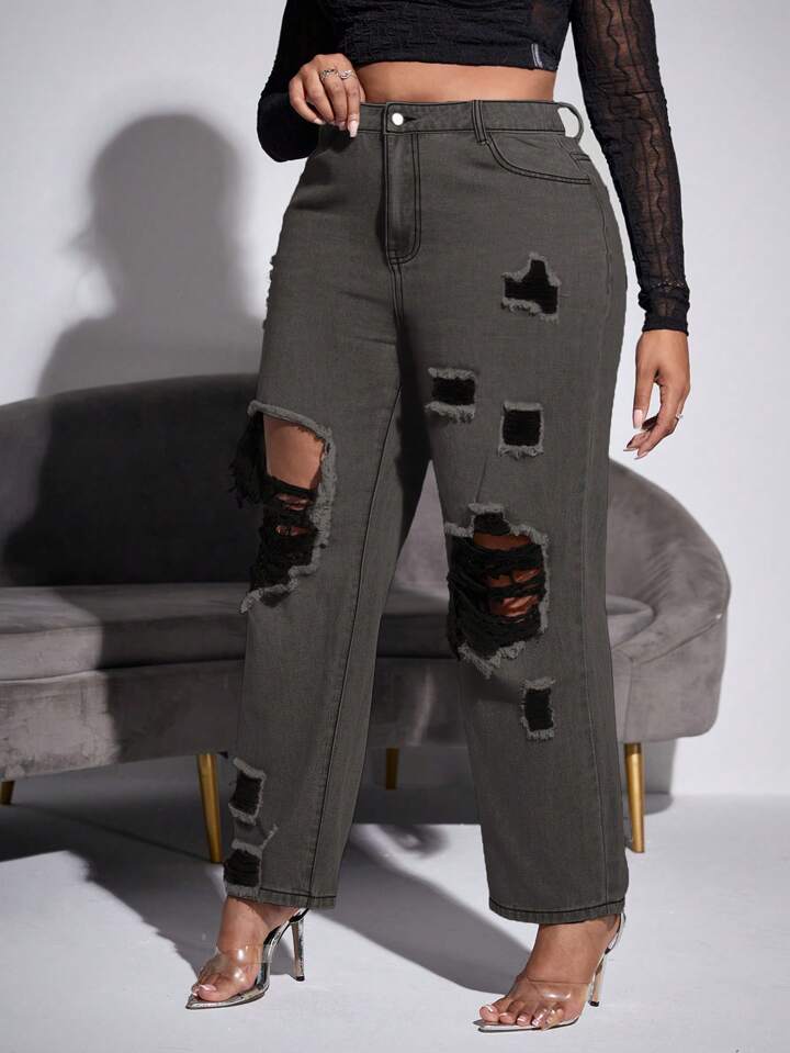 Detalle de Jeans Grises Oscuro Rotos Talla Grande para Mujer, estilo y confort.