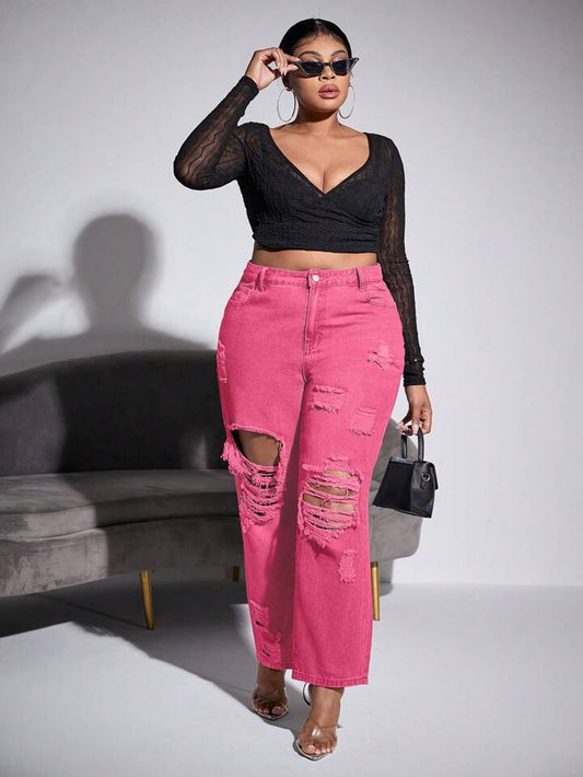 Mujer luciendo Jeans Rosa Rotos Talla Extra de PDMX, moda plus size chic.