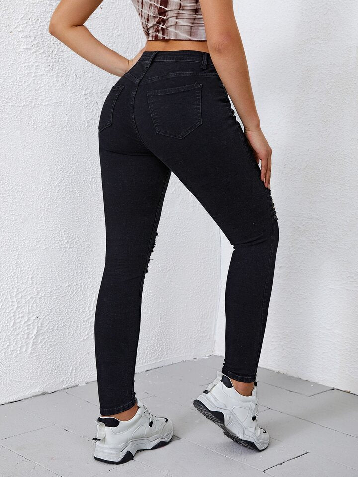 JeansSkinnyNegrosCinturaAltaDeshilachados