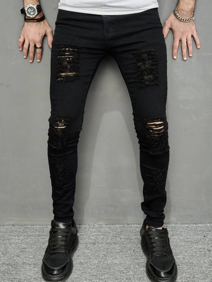 Jeans Negros Skinny Rotos para Hombre