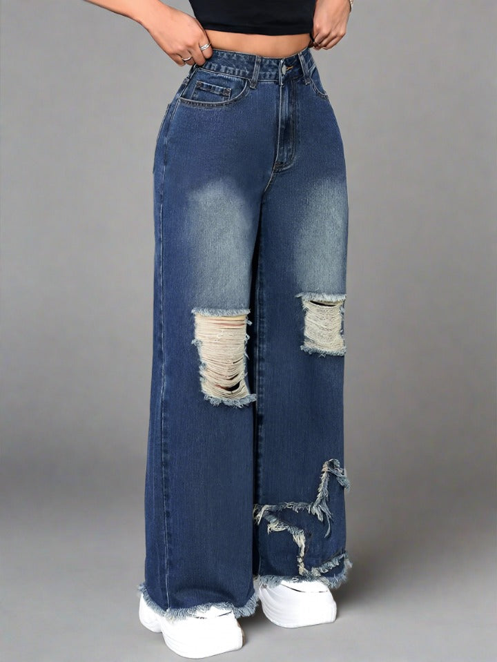 Close-up de los rotos en Jeans Azul Oscuro estilo Baggy