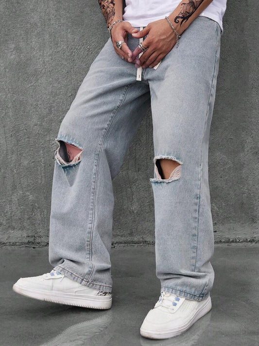 Jeans Cargo Grises Rotos PDMX para hombre - Moda con carácter