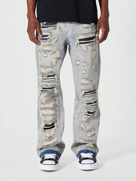 Jeans de Campana Grises Rotos PDMX para Estilo Masculino Moderno