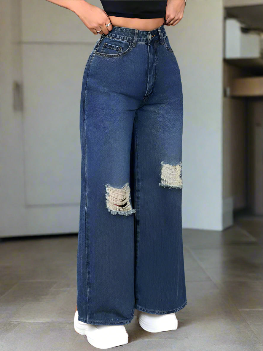 Close-up de los rotos en Jeans Azul Oscuro estilo Baggy