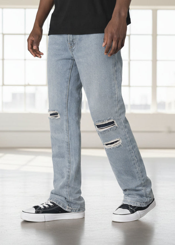 Jeans grises rotos campana para hombre PDMX Jeans con fit amplio y detalle distressed